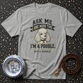 Gray t-shirt with a graphic of a poodle and text "Ask Me One More Time, I'm a Poodle. Not a Doodle."