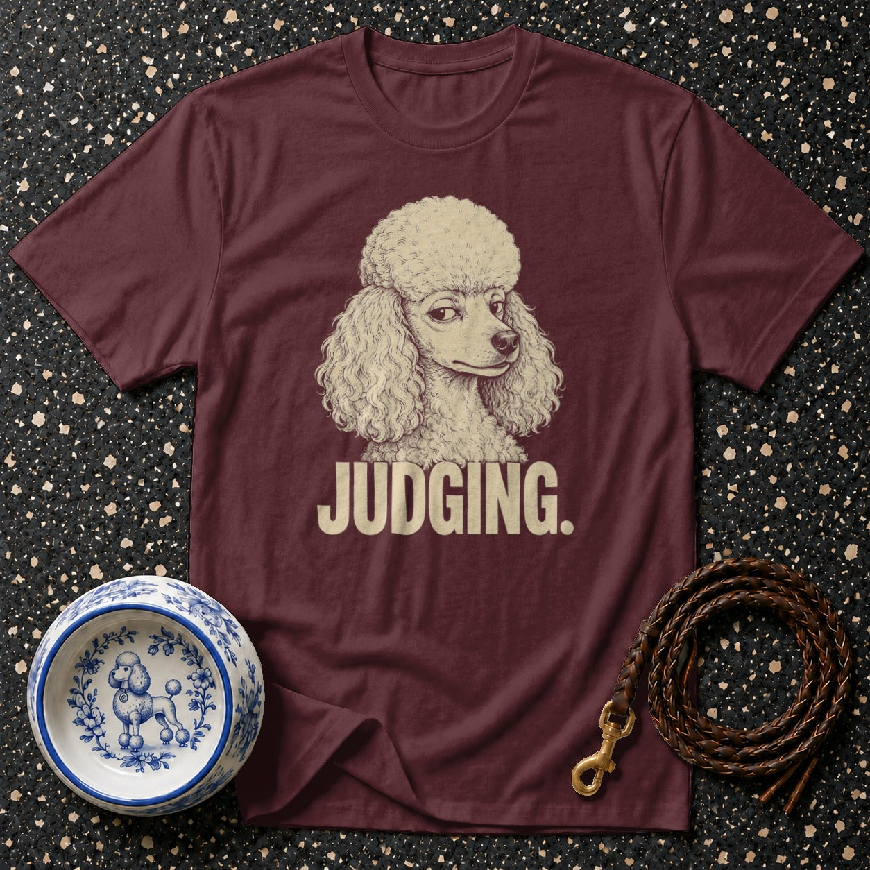 Maroon t-shirt with poodle illustration and "JUDGING." text.
