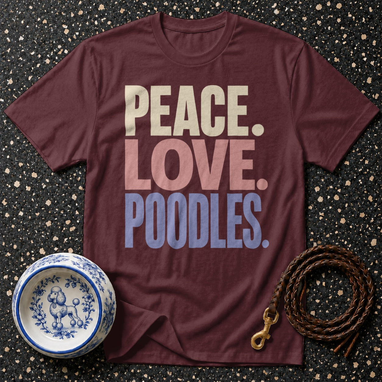 Maroon t-shirt with "PEACE. LOVE. POODLES." text, a dog bowl, and a leash.