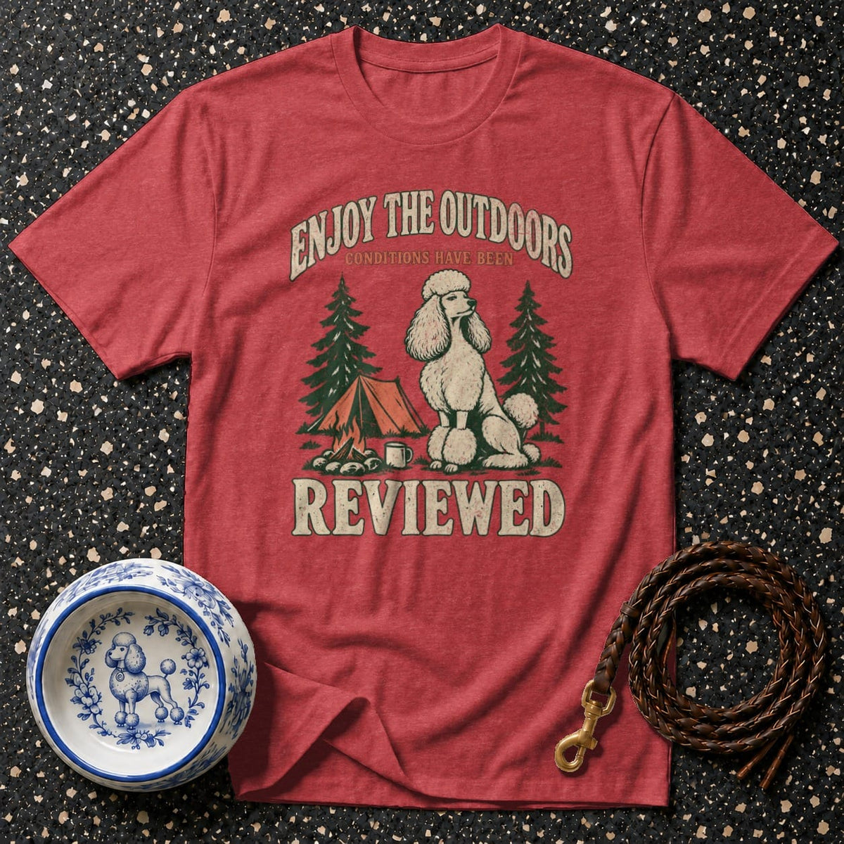 Red t-shirt with poodle camping graphic and text "Enjoy the Outdoors Reviewed".