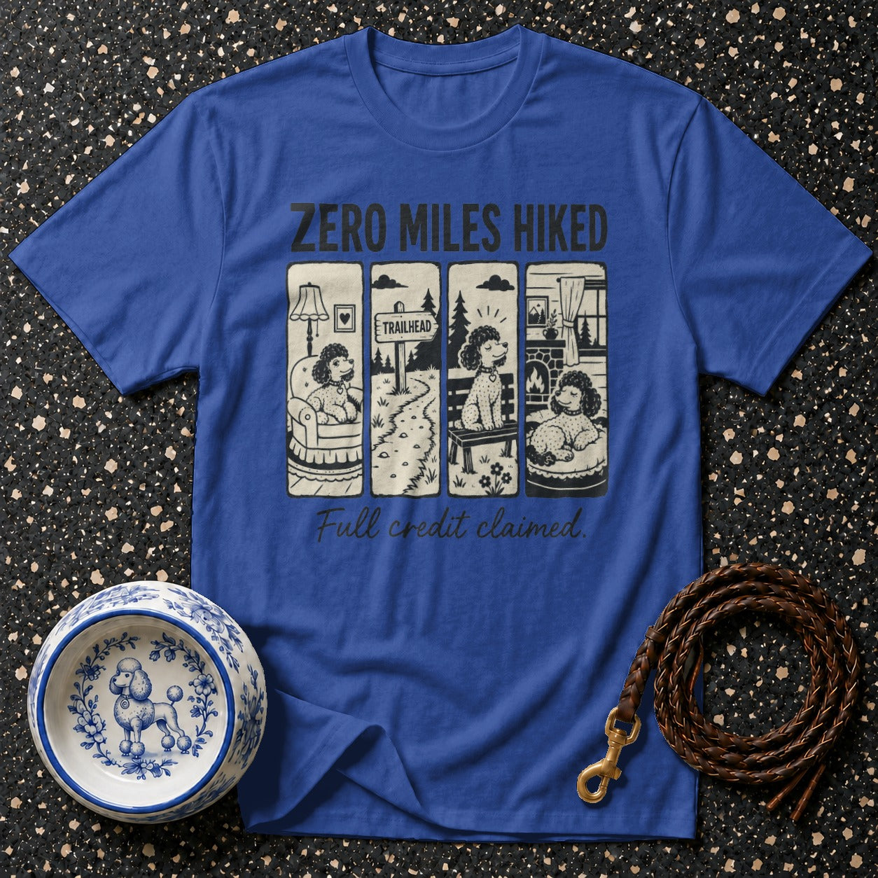 Blue t-shirt with "ZERO MILES HIKE" and four dog scenes. "Full credit claimed."