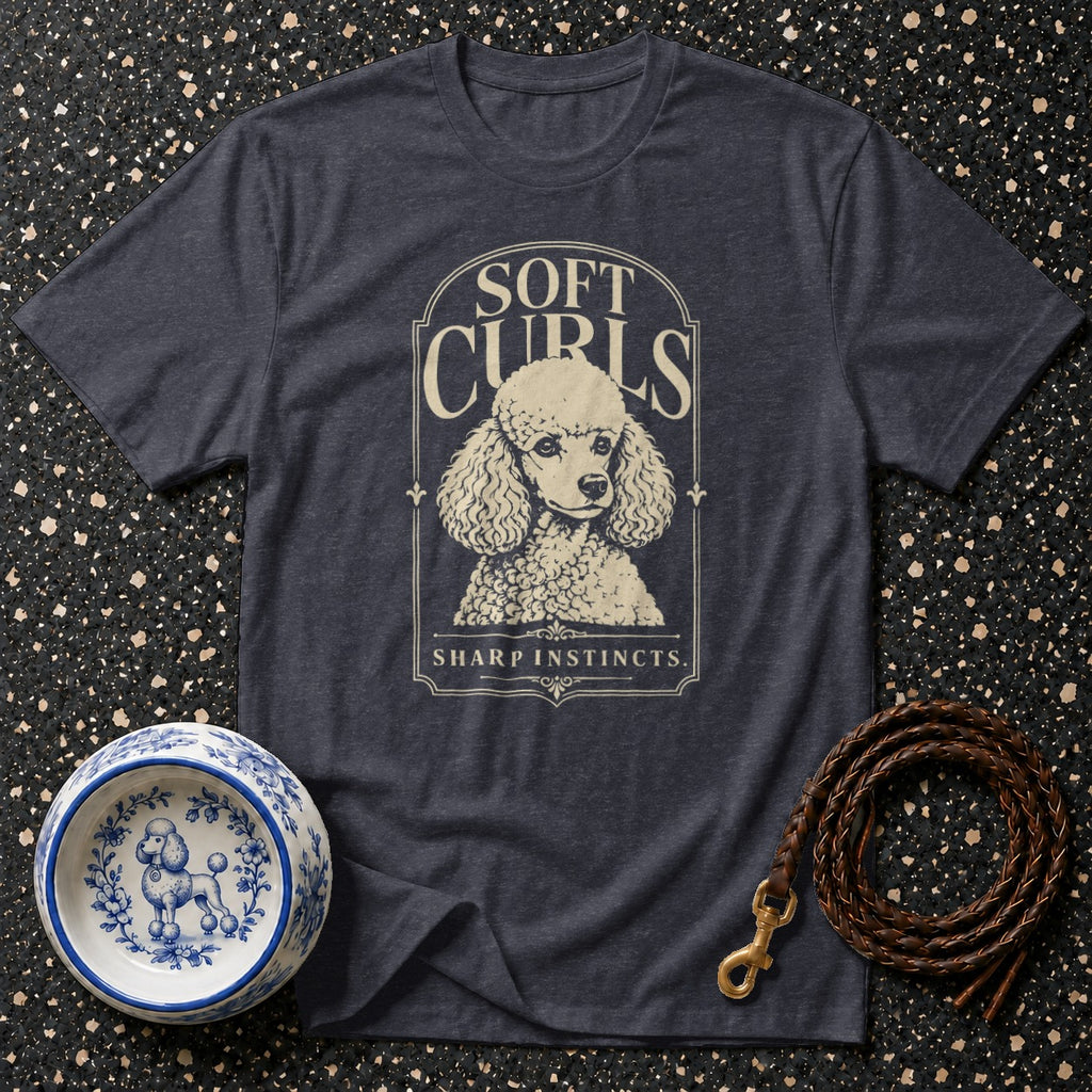 T-shirt with poodle graphic reading "Soft Curls Sharp Instincts."