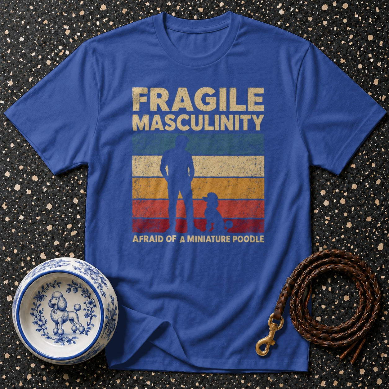 Blue t-shirt with "Fragile Masculinity Afraid of a Miniature Poodle" text.