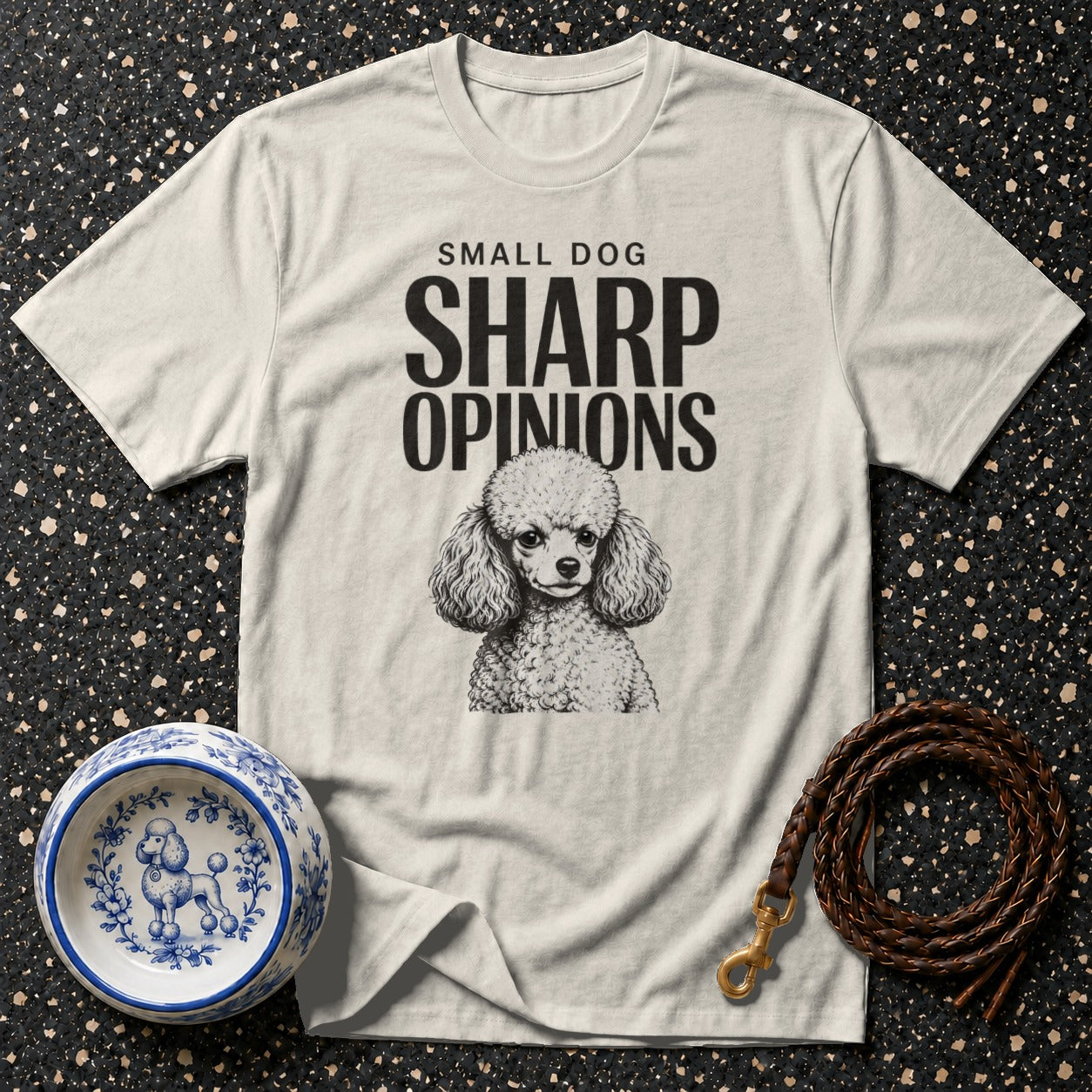 Cream t-shirt with poodle illustration and "Small dog sharp opinions" text.