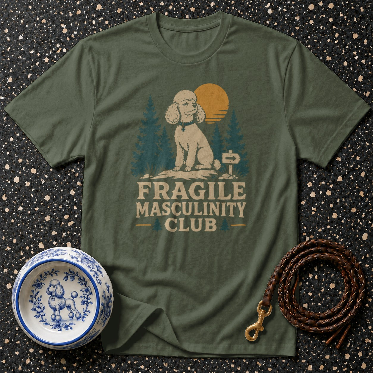 Olive green t-shirt with vintage poodle graphic and "Fragile Masculinity Club" text.