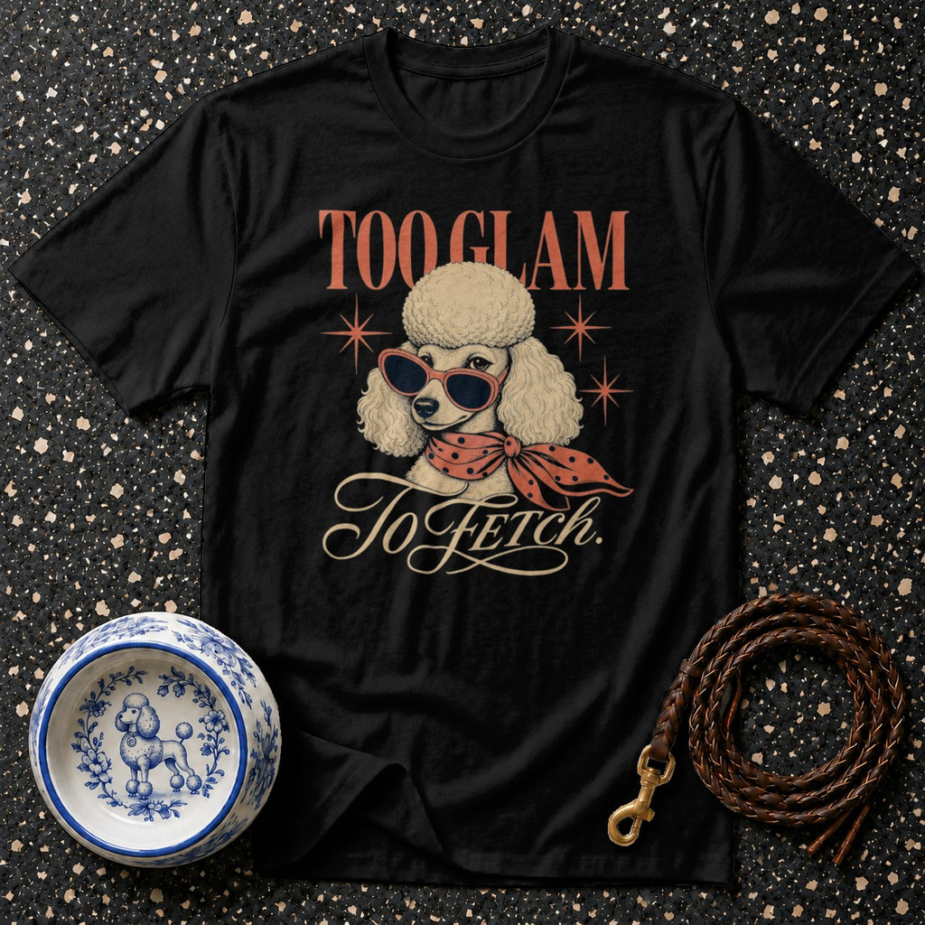 Black t-shirt with poodle graphic saying "Too Glam To Fetch" and a patterned bowl.