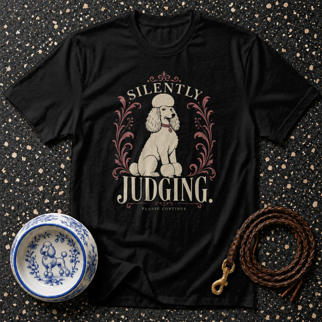 Black t-shirt with a poodle and text "Silently Judging. Please Continue."
