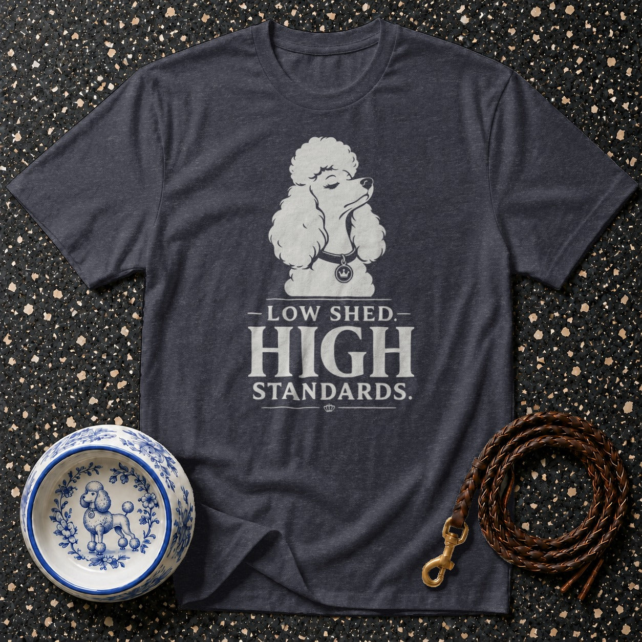 Dark gray t-shirt with a white poodle graphic and text "LOW SHED. HIGH STANDARDS."