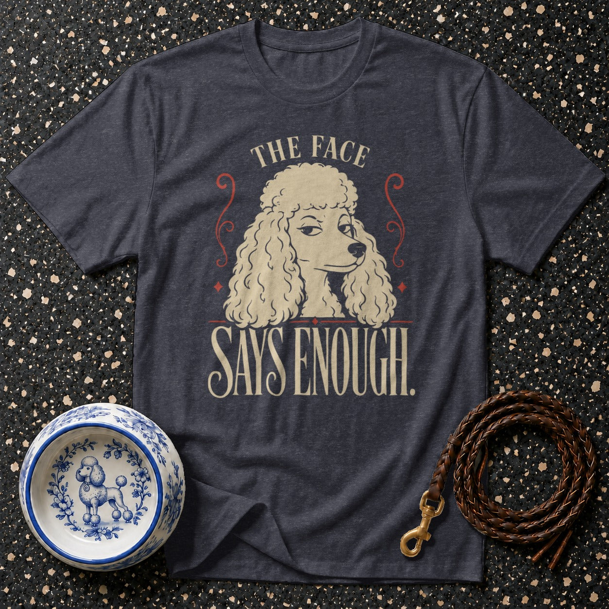 Dark gray t-shirt with poodle graphic reading "The Face Says Enough."