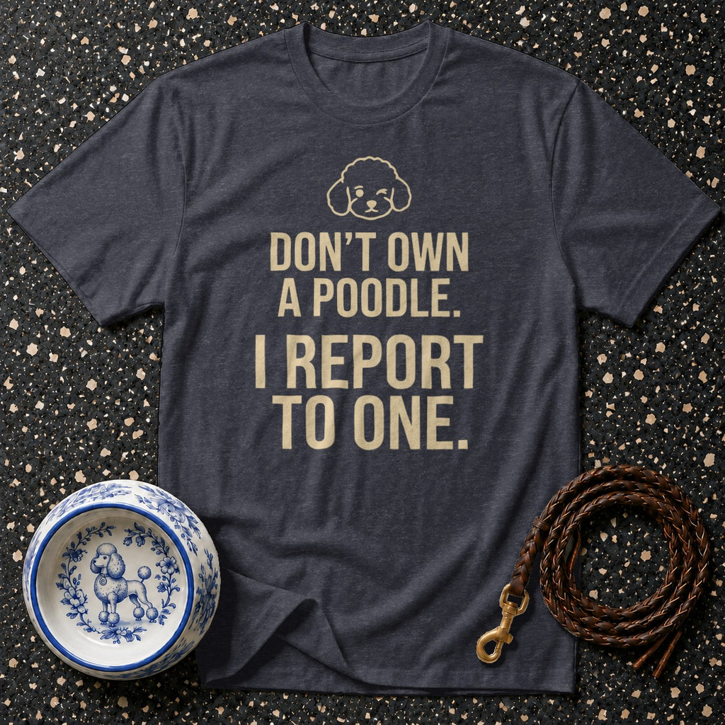 Dark t-shirt with poodle graphic and text "Don't own a poodle. I report to one."