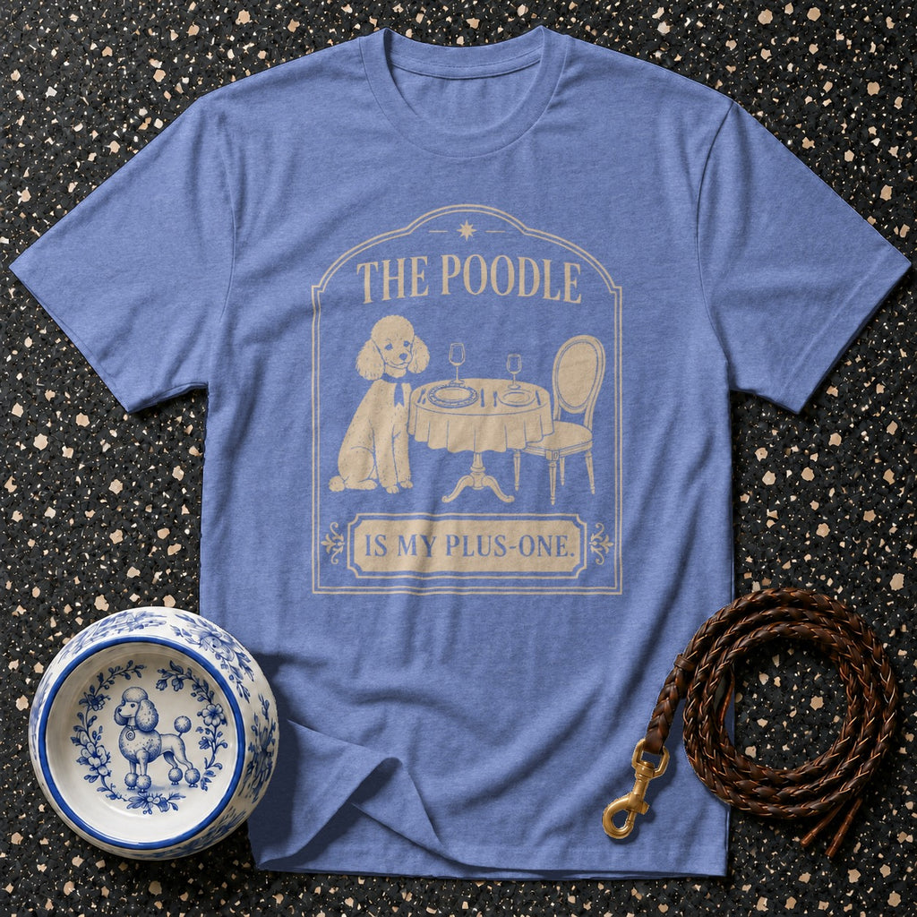 Blue t-shirt with "The Poodle is My Plus-One" graphic featuring a poodle at a table.