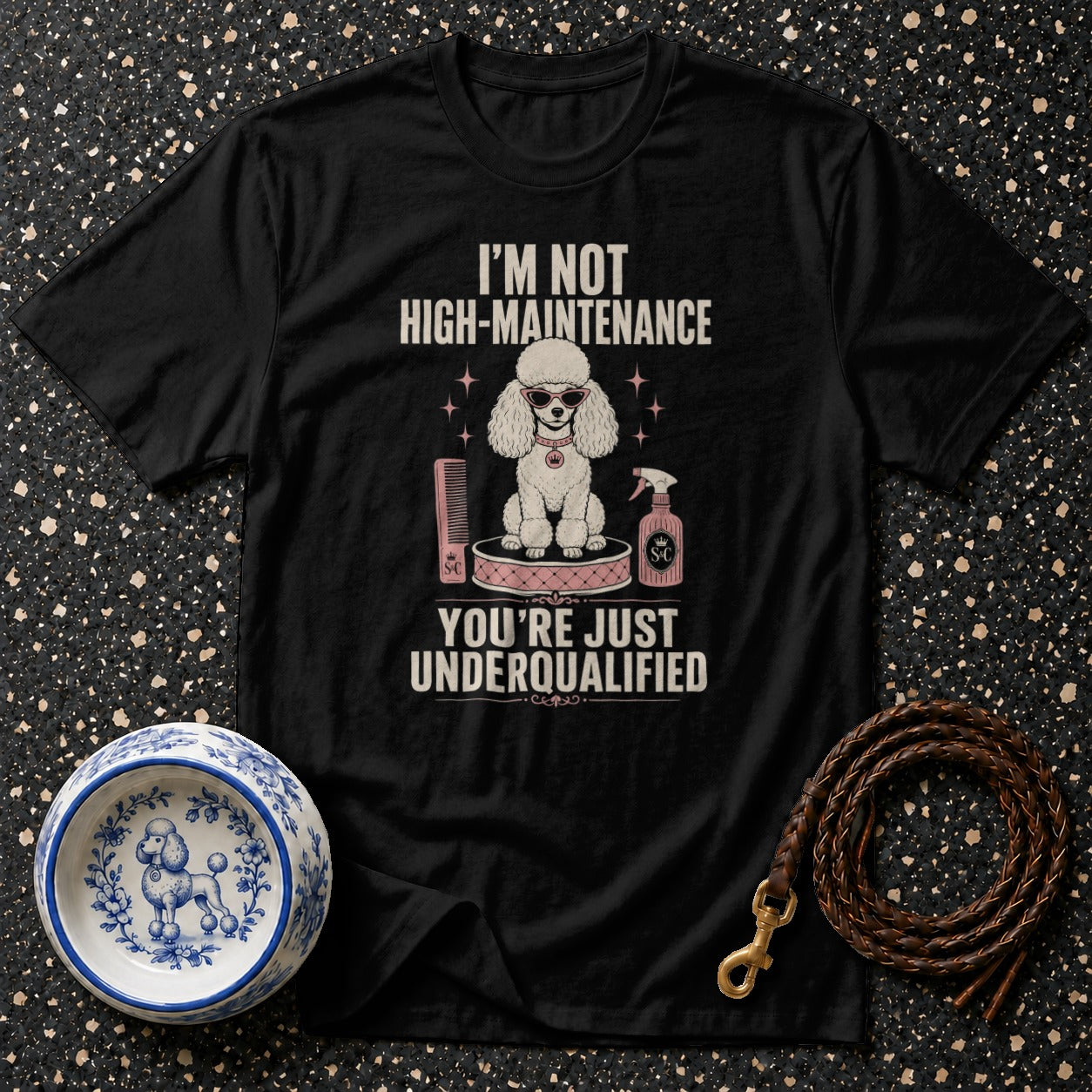Black t-shirt with poodle graphic and text: "I'M NOT HIGH-MAINTENANCE" and "YOU'RE JUST UNDERQUALIFIED".