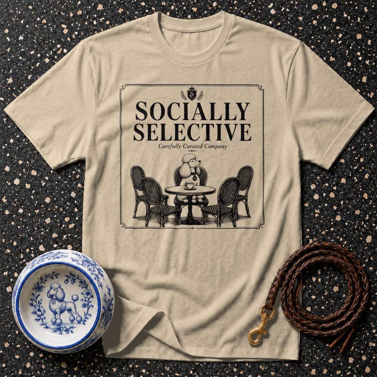 Light beige t-shirt with "Socially Selective" text and poodle illustration.