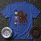 Blue t-shirt with brown poodle graphic and "ABSTRACT VERY SPECIFIC" text.