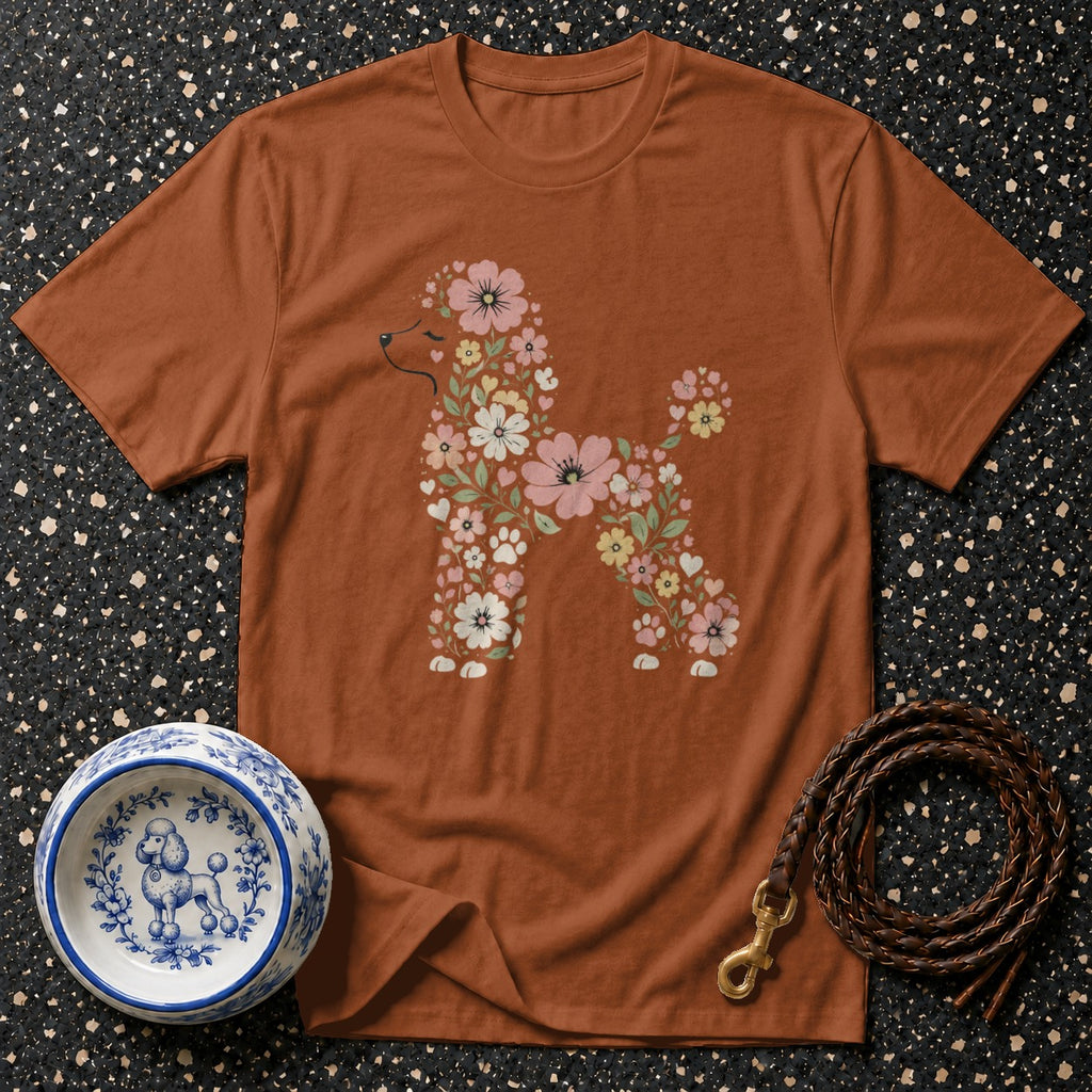 Brown t-shirt with poodle silhouette made of flowers and paw prints.