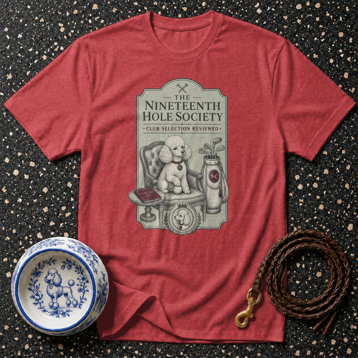 Red t-shirt with "The Nineteenth Hole Society" crest and a poodle.