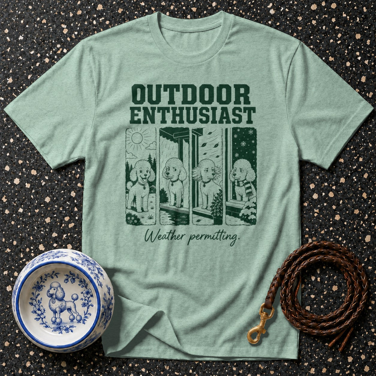 Green t-shirt with "OUTDOOR ENTHUSIAST" text and four poodles in different weather.