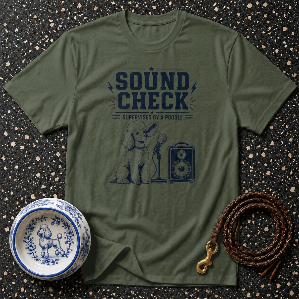 Green t-shirt with navy graphic of a poodle, microphone, and speaker, reading "Sound Check Supervised by a Poodle".