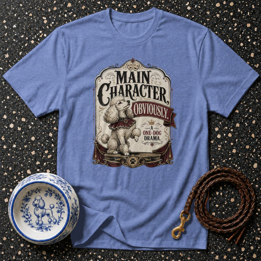 Light blue t-shirt with "Main Character, Obviously. A One-Dog Drama" graphic and poodle.