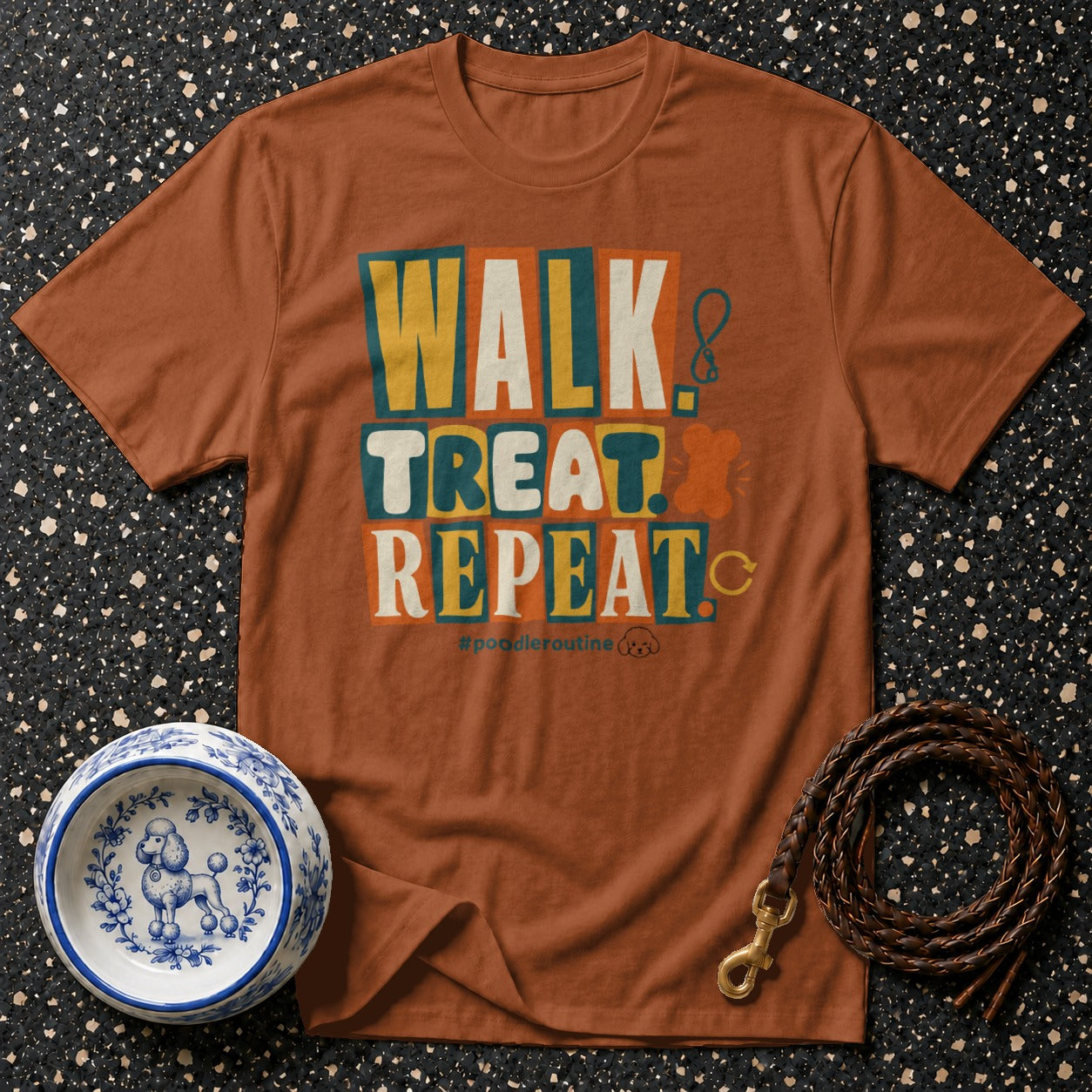 Brown t-shirt with "WALK TREAT REPEAT" text and poodle icons.