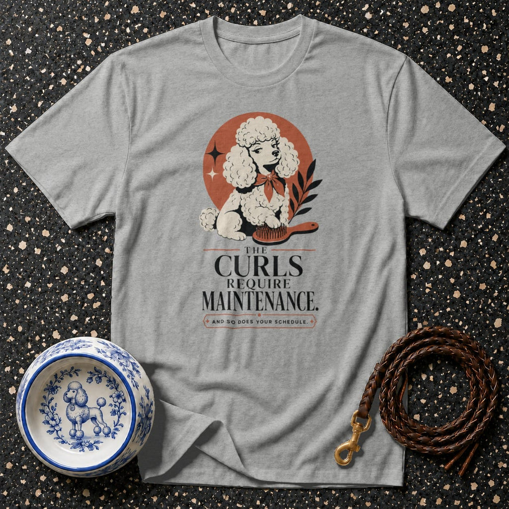Grey t-shirt with a graphic of a poodle and the text "The Curls Require Maintenance."