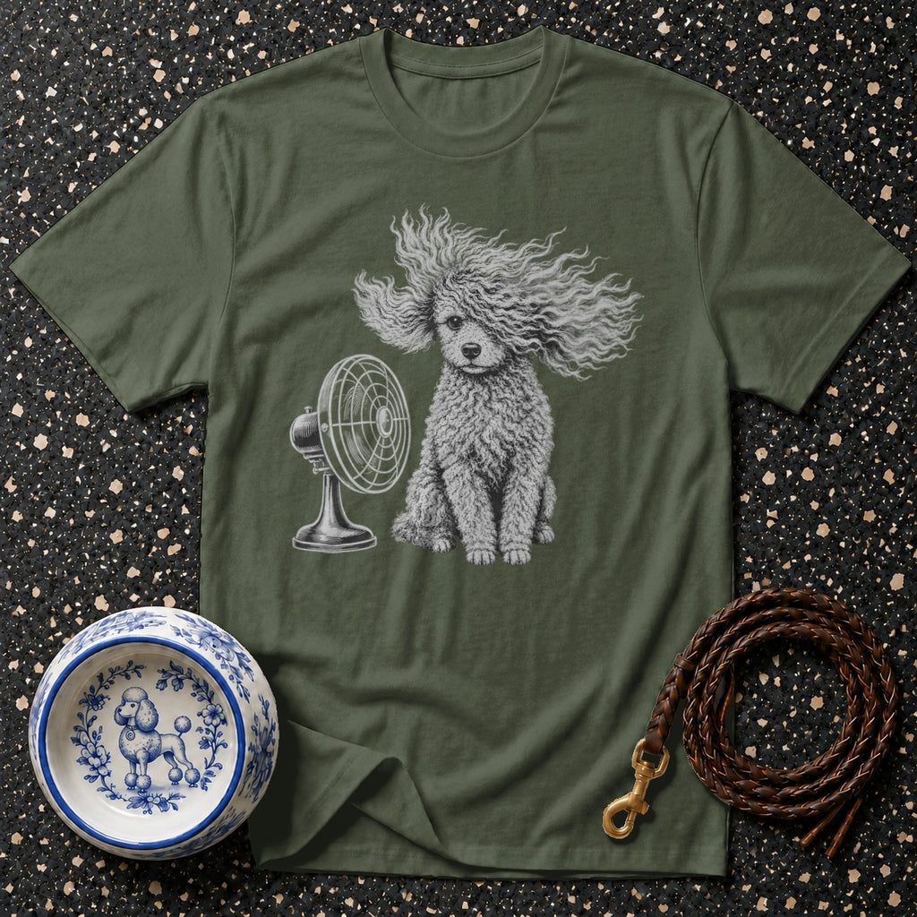 Green t-shirt with poodle graphic blowing in fan wind, dog bowl, and leash.