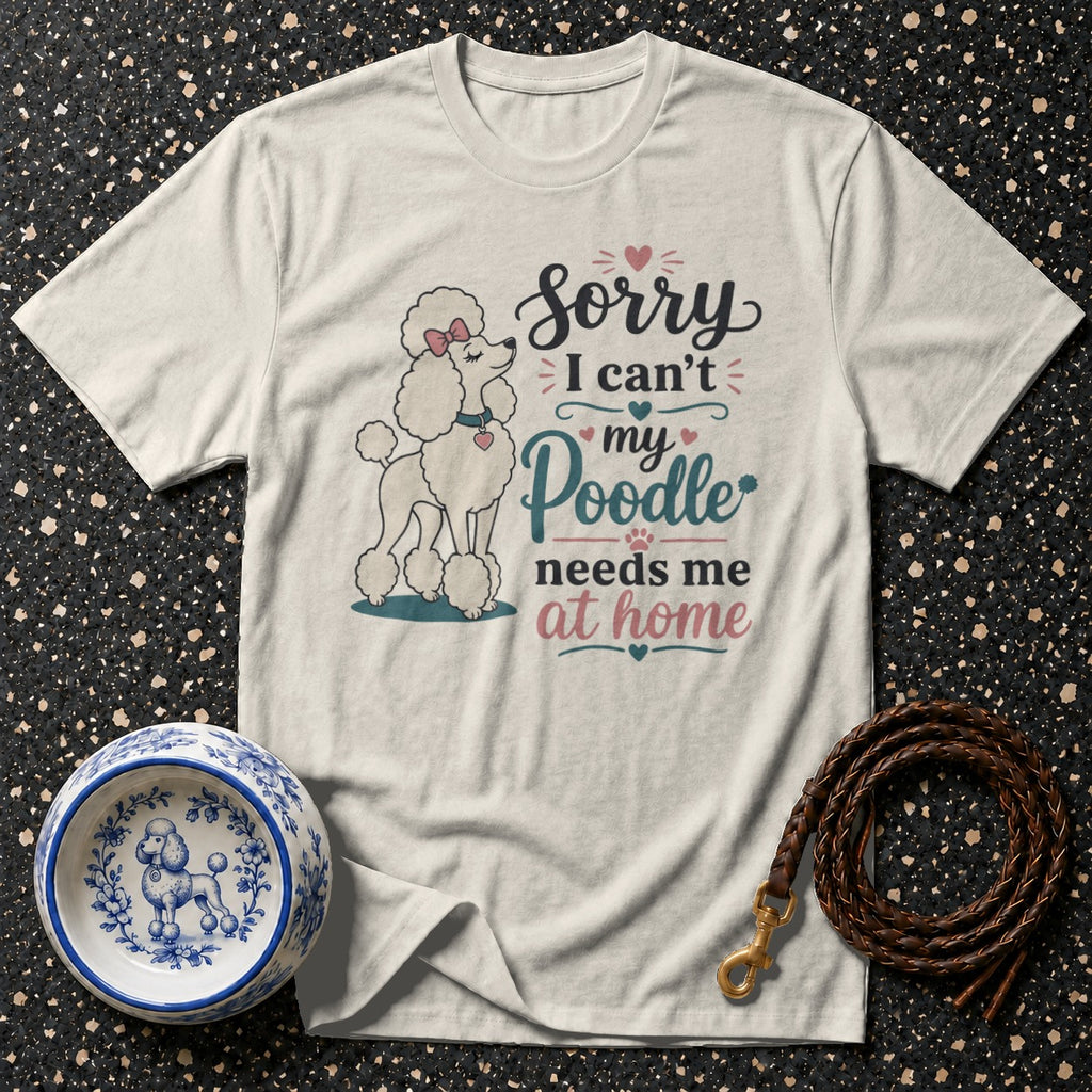 White t-shirt with a cartoon poodle and text "Sorry I can't my Poodle needs me at home."