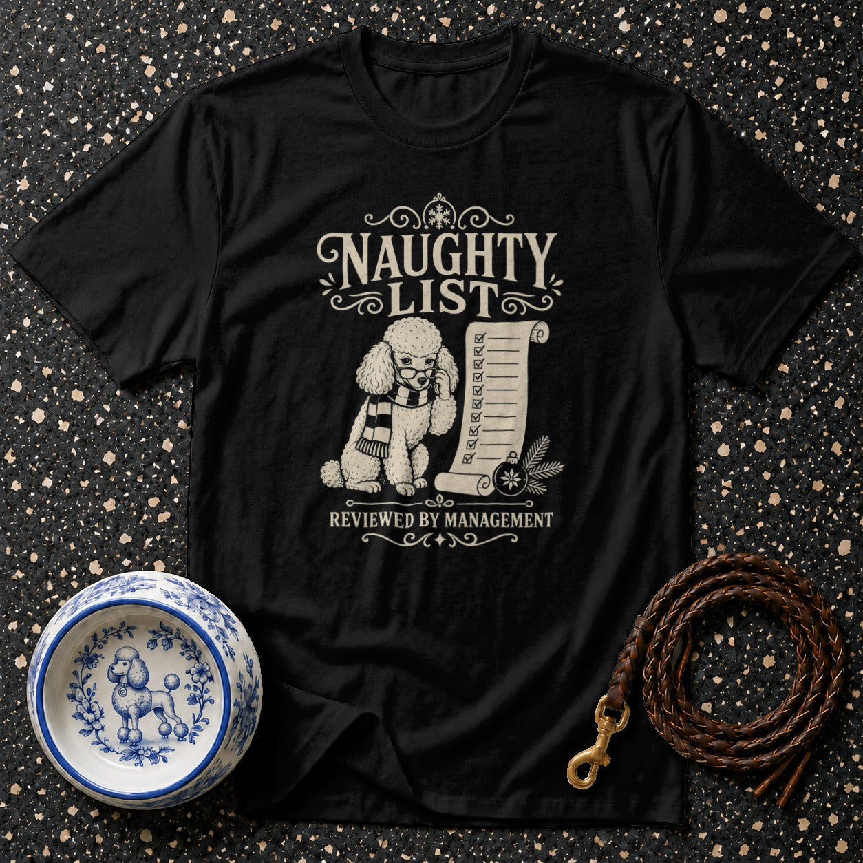 Black t-shirt with "Naughty List Reviewed by Management" text and a poodle.