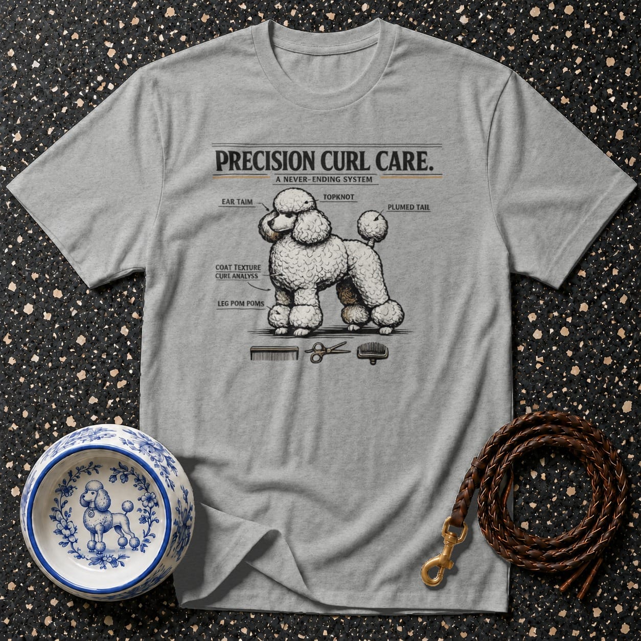 Grey t-shirt with diagram of a poodle's grooming points, labeled "Precision Curl Care."