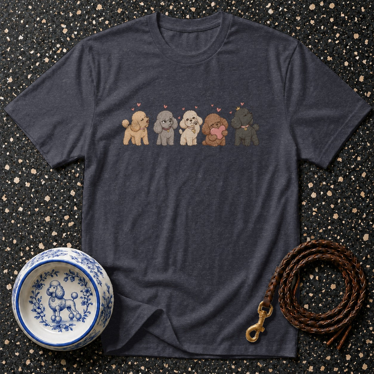 Dark heather t-shirt with a line of five cartoon poodles and small hearts above.