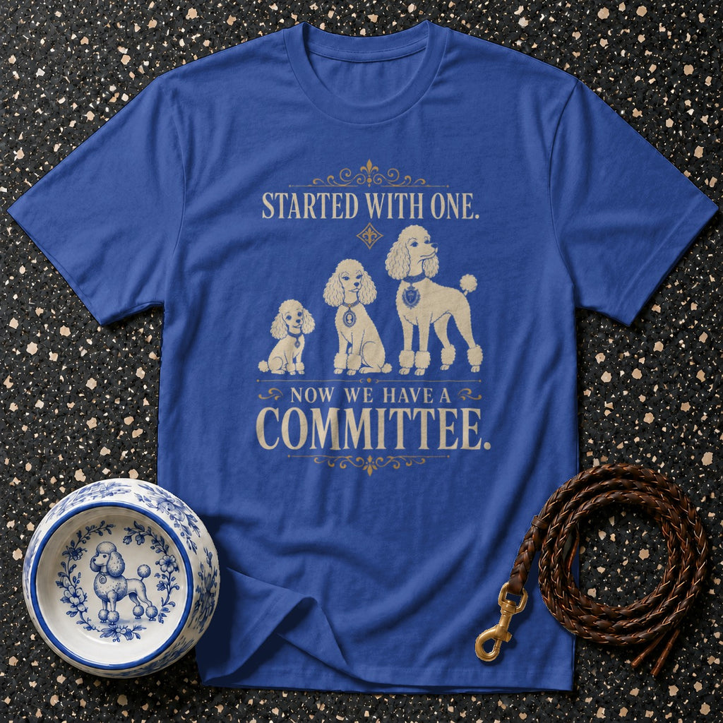 Blue t-shirt with three poodles and text "STARTED WITH ONE. NOW WE HAVE A COMMITTEE."