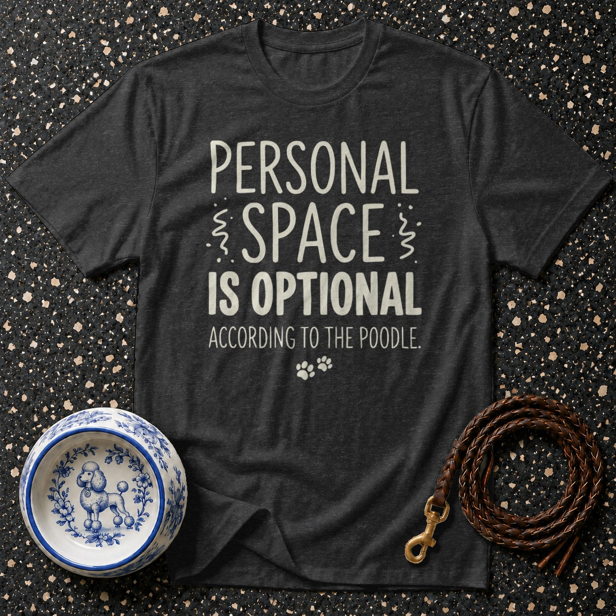 Dark t-shirt with "Personal Space Is Optional According To The Poodle" text.