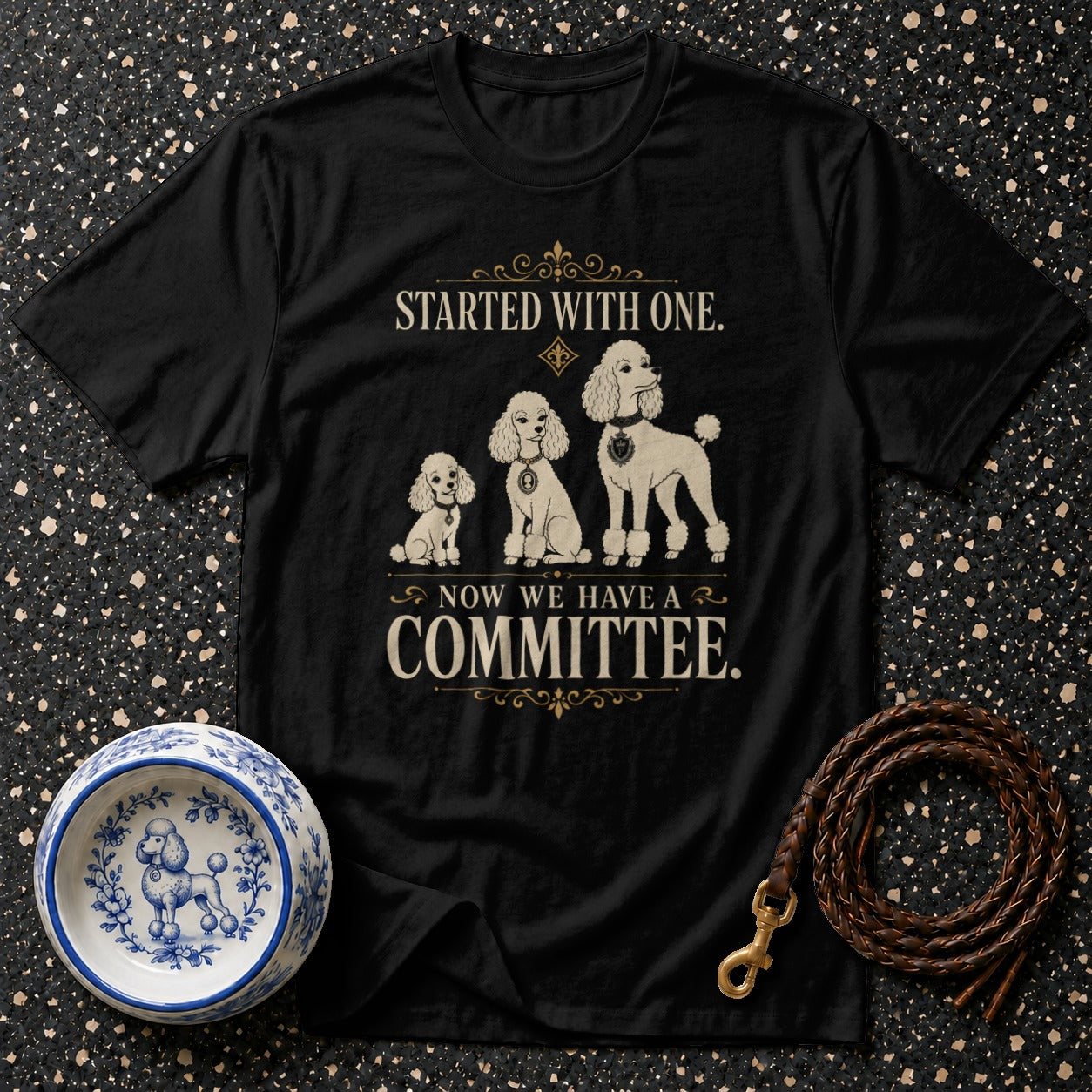Black t-shirt with three poodles and text "STARTED WITH ONE. NOW WE HAVE A COMMITTEE."