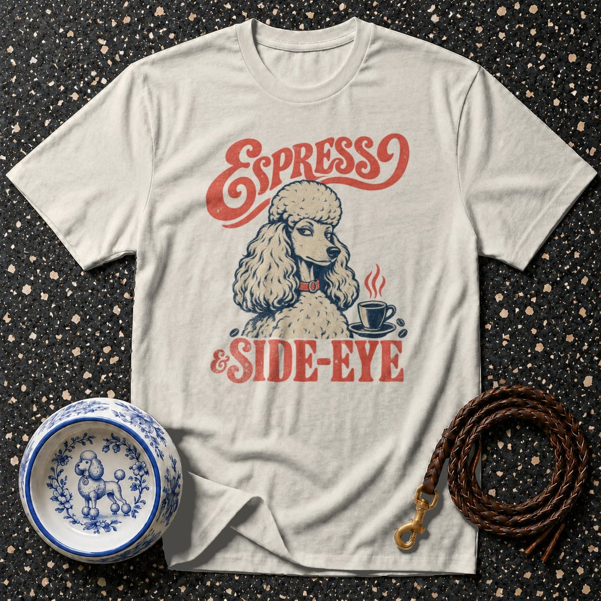 Light t-shirt with a poodle, coffee cup, and text "Espresso & Side-Eye".