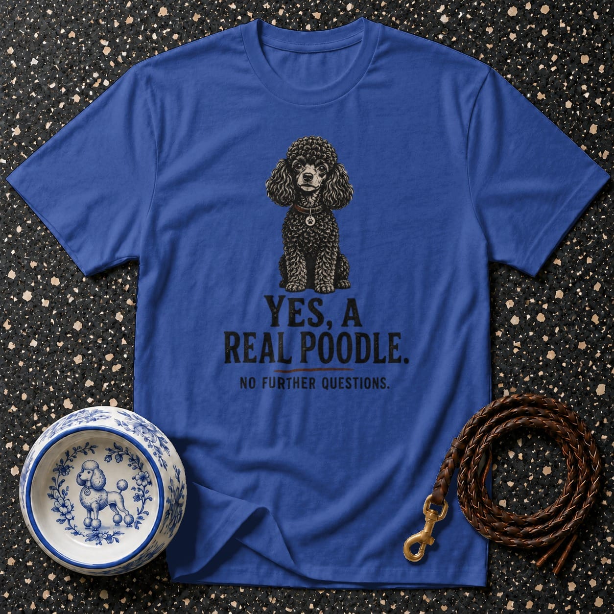 Blue t-shirt with a black poodle graphic and text: "YES, A REAL POODLE. NO FURTHER QUESTIONS."