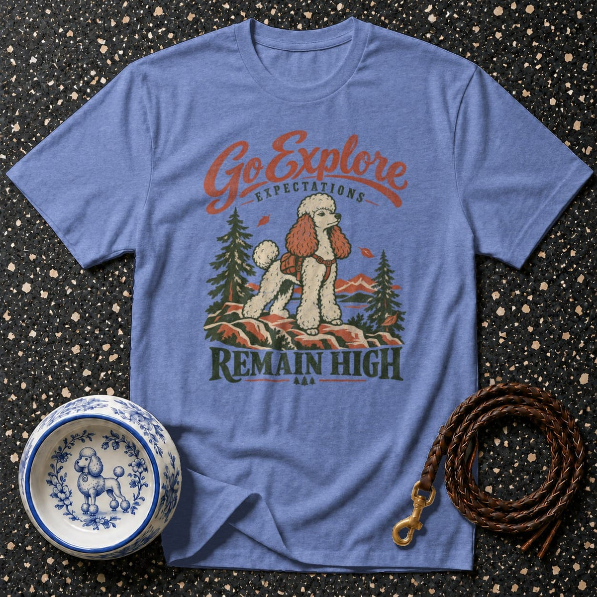 T-shirt with graphic of poodle hiking, saying "Go Explore Expectations Remain High".