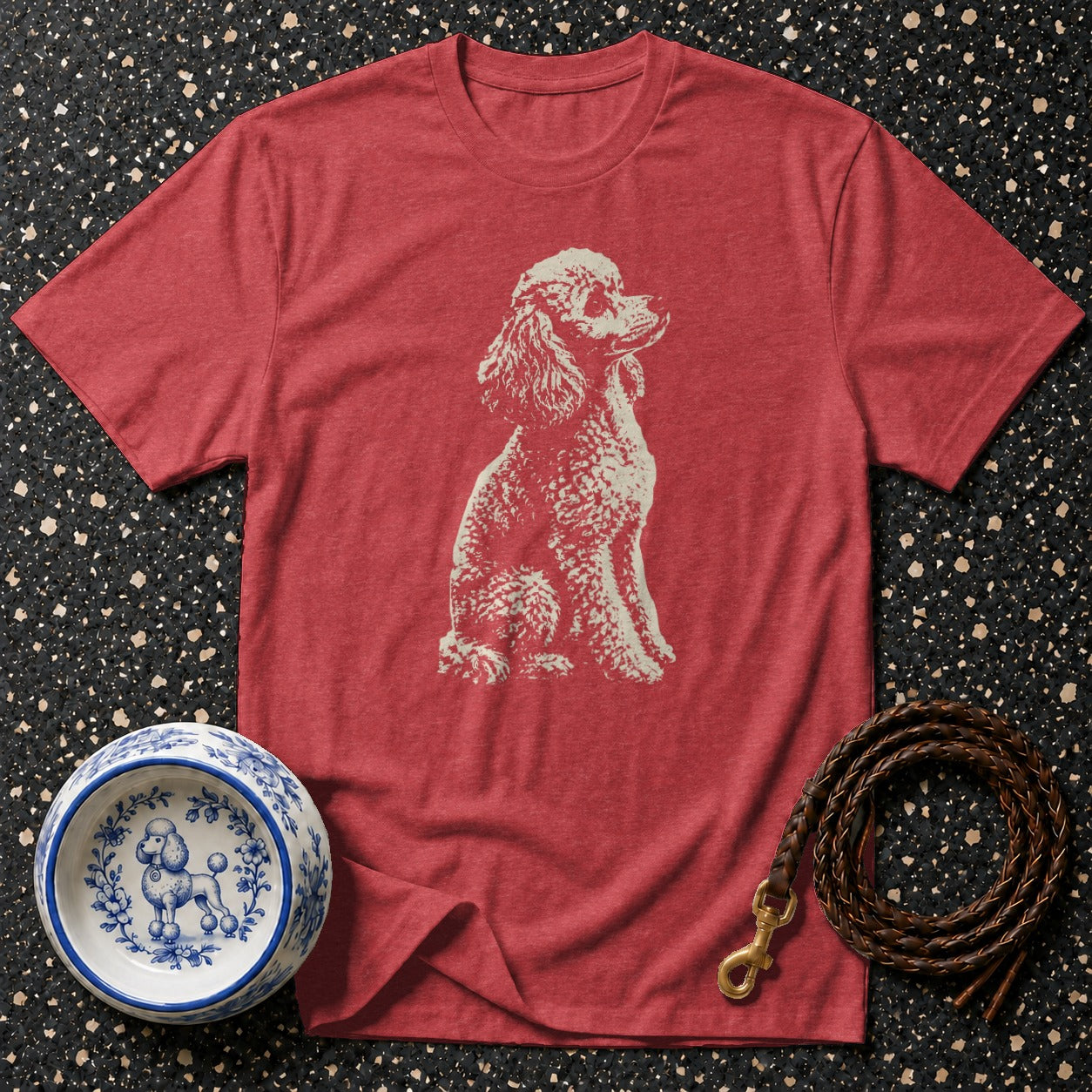 Red t-shirt with cream poodle graphic, dog bowl and leash.
