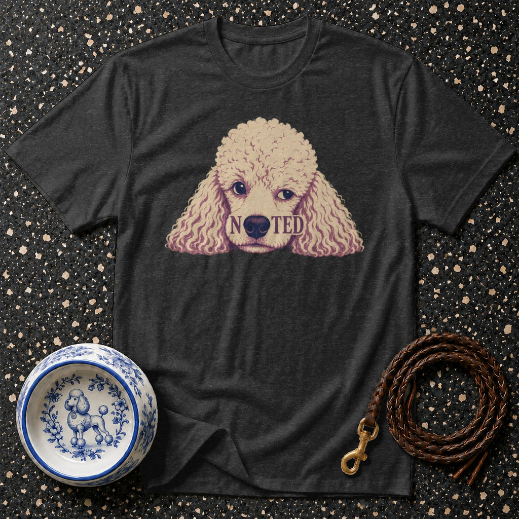Dark grey t-shirt with a poodle graphic that reads "NOTED".