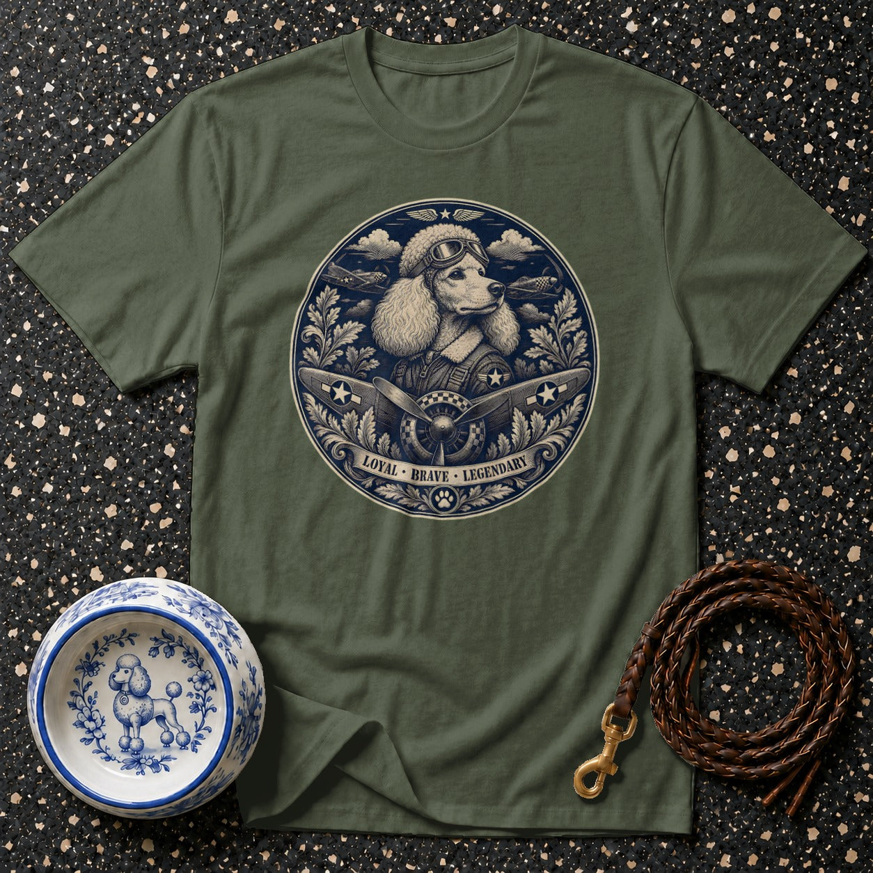 Poodle pilot graphic on olive green t-shirt with lettering "Loyal Brave Legendary".