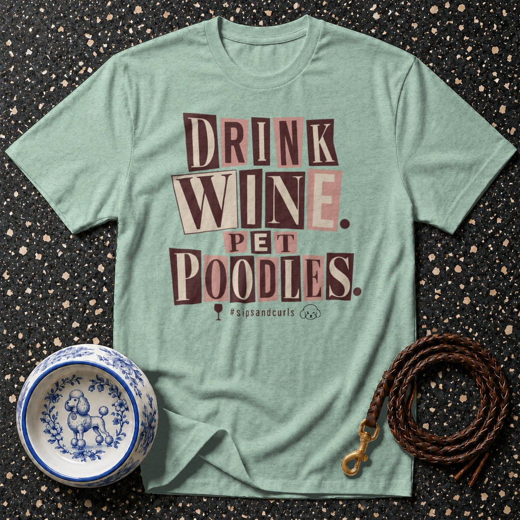 Light green t-shirt with "DRINK WINE PET POODLES" text and hashtag.