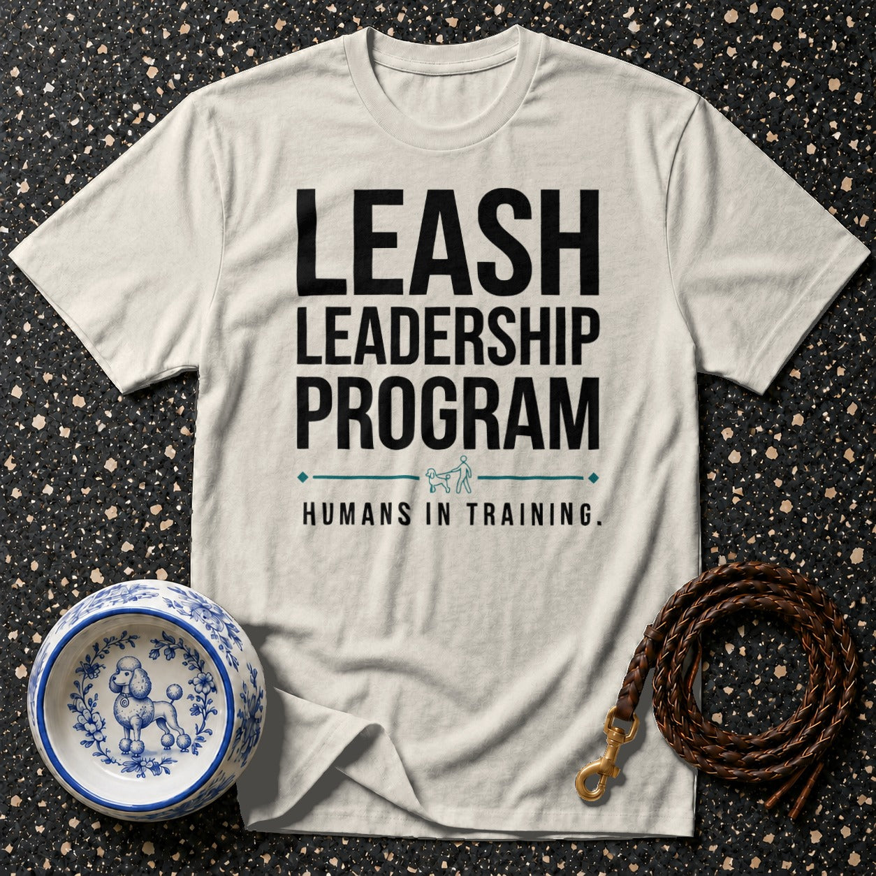 Cream t-shirt with "Leash Leadership Program Humans in Training" text and dog graphics.