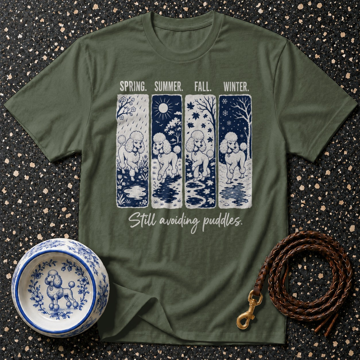 T-shirt with four seasonal panels of poodles and text "Still avoiding puddles."
