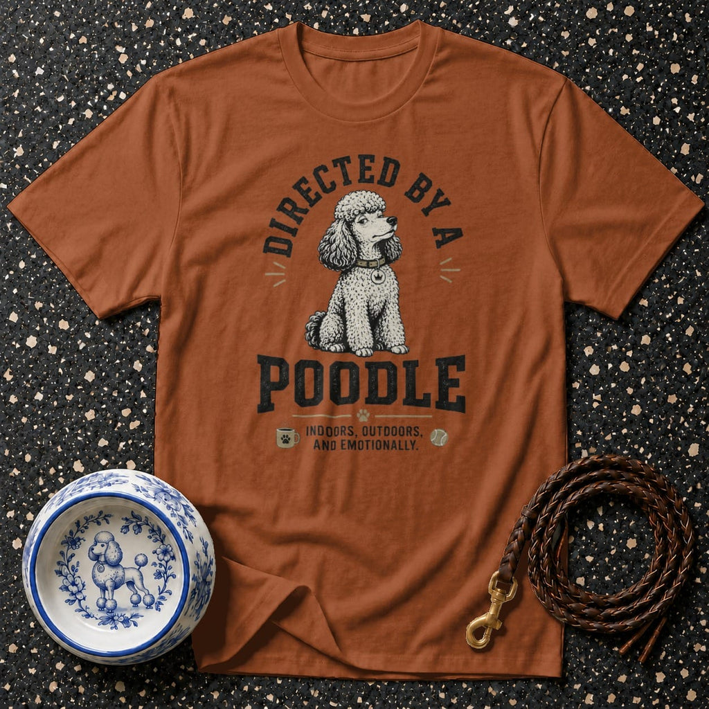 Orange t-shirt with a poodle graphic and text "Directed by a Poodle, Indoors, Outdoors, and Emotionally."