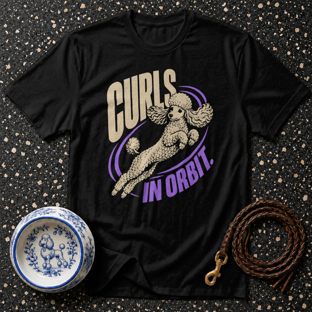 Black t-shirt with "Curls in Orbit" text and a poodle graphic.
