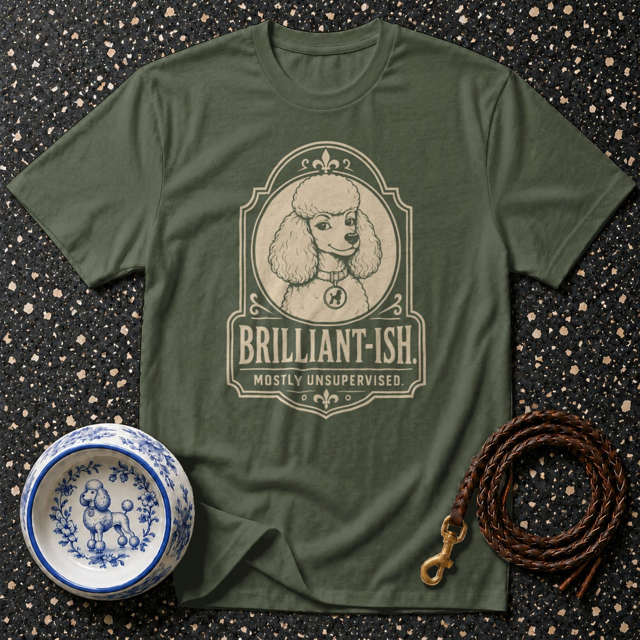 Green t-shirt with "Brilliant-ish. Mostly Unsupervised." poodle graphic.