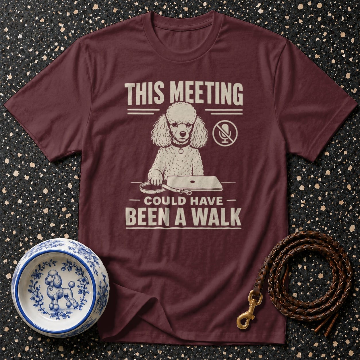Maroon t-shirt with poodle graphic and text "This meeting could have been a walk".