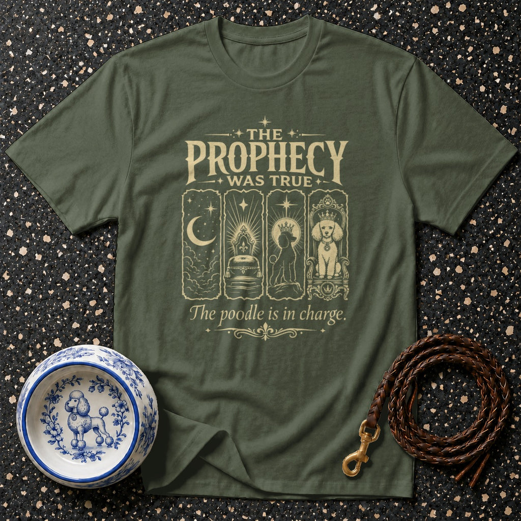 Olive green t-shirt with "The Prophecy Was True. The poodle is in charge." text and poodle graphic.