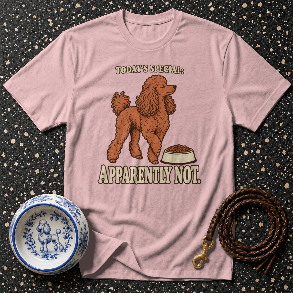 Pink t-shirt with a poodle illustration and text "TODAY'S SPECIAL: APPARENTLY NOT.".