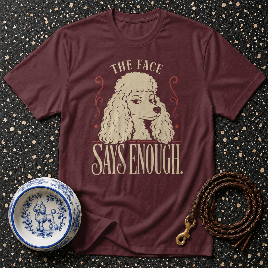 Maroon t-shirt with a poodle graphic that says "The face says enough."