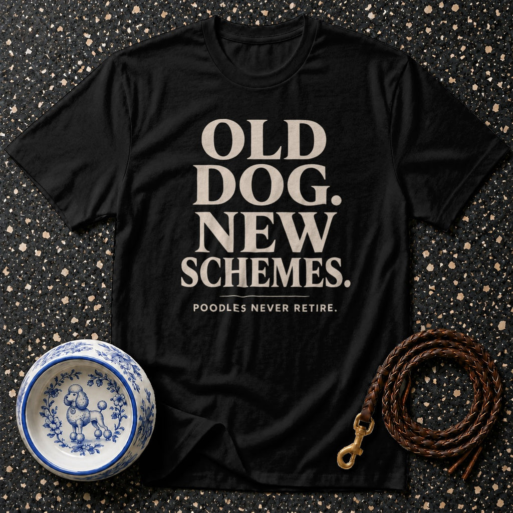 Black t-shirt with text "OLD DOG. NEW SCHEMES." and "POODLES NEVER RETIRE."